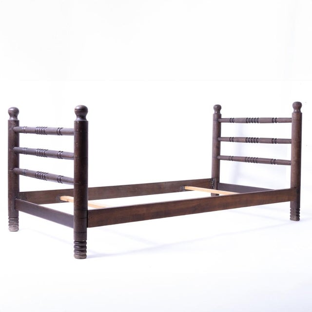 Incredible and rare vintage twin bed frame by Charles Dudouyt, circa 1940's France. Long oak wood frame with carved...
