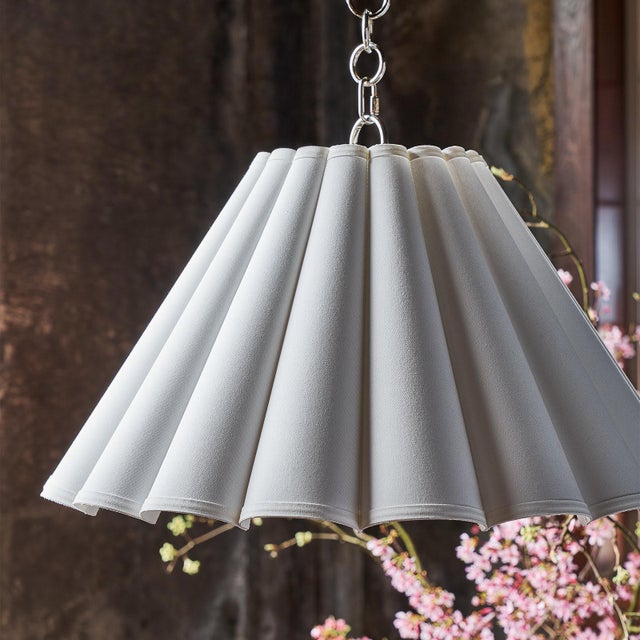 Softly sculptural, the Allison Pendant casts a warm and inviting glow in clean white. The pendant's graceful curves easily...