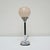 An original art deco table lamp. Chromed stem with ornate peach pink glass globe shade. Dimensions: h 46cm w 12cm origin:...