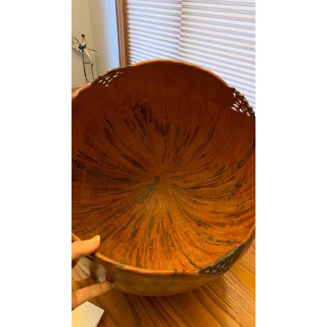 Carved by one of Hawaii's finest artists in the early 2000s. Dimensions are height: 15" and diameter: 14".