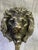 Pair of lion head-shaped coat hooks in solid brass. English production, 1940/50, cast in high-quality solid brass, a...