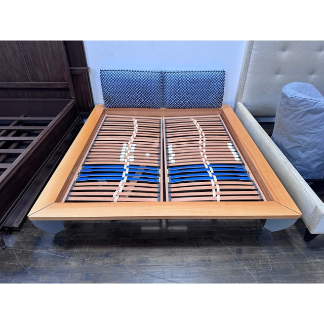 Design Plus Gallery presents a Ligne Roset Parallel Eastern King Bedframe Attributed to Peter Maly. Comprised of Beech...