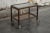 Art Deco bar or serving cart made of Swedish flame birch on casters. Two-tiered trolley has wheels and a glass top. Curved...