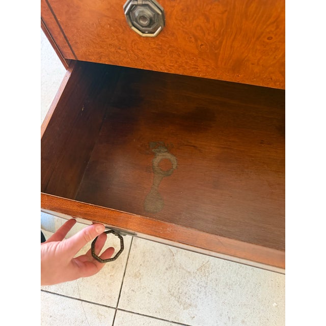 Bring timeless charm and character into your home with this beautifully preserved vintage drop-front secretary desk....