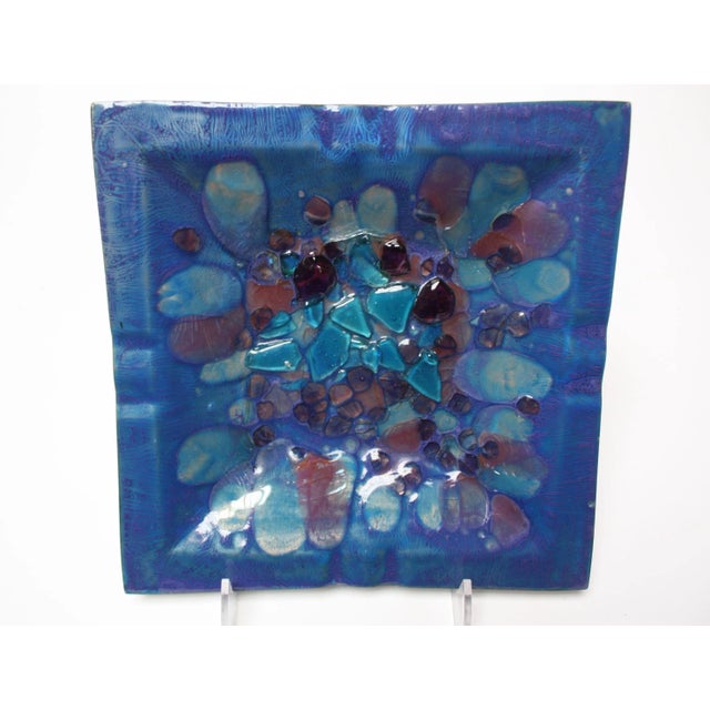 Spectacular 1960s square enamel on copper dish by Los Angeles, CA enamelist, Myrna Eaton measuring 9.5" square. This work,...