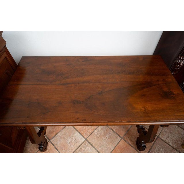 Antique refectory table in solid walnut from the early 18th century in Naples. Crafted entirely from finely crafted solid...