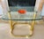 For your review... a Leon Rose era brass and glass side table by PACE Collection. This Hollywood Regency style piece is...