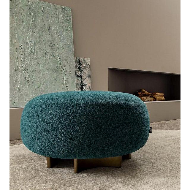 Punto e virgola bouclé wool pouf by morica design dimensions: d 80 x w 80 x h 41 cm. Materials: blue bouclé wool,...