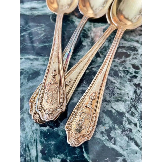 A set of 4 antique circa 1913 gilt over silver plate tea spoons from the Biltmore hotel in NYC! In excellent condition, no...