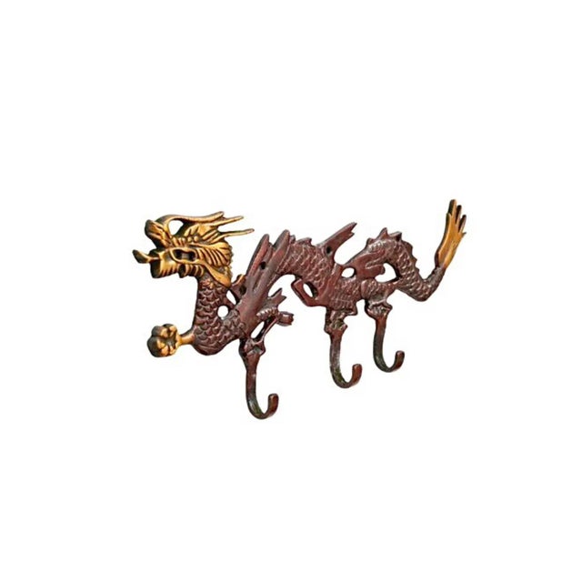 A Chinoiserie red brass wall fixture with three hooks. A central bar is cast in the shape of a Chinese dragon decorated...