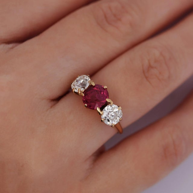 Antique Spinel and Diamond Three Stone Ring. Set with 4 carats total in natural gemstones. This antique circa 1920 ring...