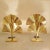 Pair of Ginko Biloba table or desk lamps, Italy circa 2010s. The Italian lamps are made of two hammered brass ginko leaves...
