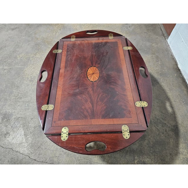 Store Item: Hekman Butler Table Mahogany Coffee Table w/ Sunburst Inlay in the Federal Style Description: Federal style...