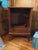 Vintage cherry television hutch comes with custom cut glass top.