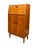 This Vintage Mid-Century Modern Teak Wood Petite Flip-Top Cocktail Table Bar Cabinet, likely an import from the UK, is a...