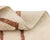 Exquisite hand-knotted wool rug with handwoven geometric patterns in Cinnamon Stick on an Ivory backdrop, perfect for...