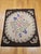 This exceptional Vintage American hand-hooked rug, dating to the early 1900s, is a rare and beautifully preserved example...