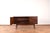 This walnut sideboard was designed in the 1960s by the Polish designer Stanisław Albrecht and manufactured by Bydgoskie...