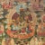 An incredible and rare 18th century Tibetan Thangka depicting the Green Tara seated on a lotus throne with her right hand...