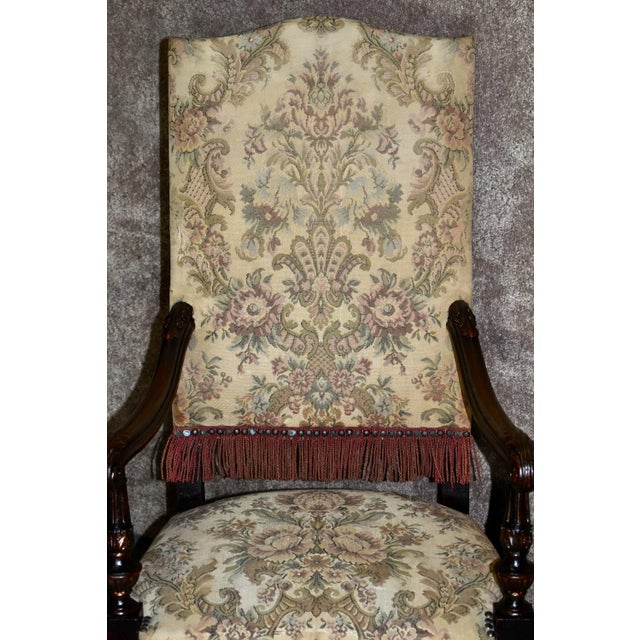 Antique (1920s) High Back Chair has a Tudor Style. The Frame is Wood. Carved Oak with a Stretcher Base. Tapestry Type...