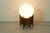 This eye-catching lamp features a vintage spherical lampshade paired with a newly handcrafted wooden base (american nut),...