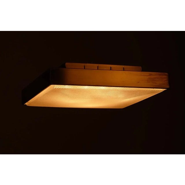 Pair of flush mount ceilings lamps with brass frames and acrylic diffusion. Produced in Sweden, 1960s. Up to 250V...