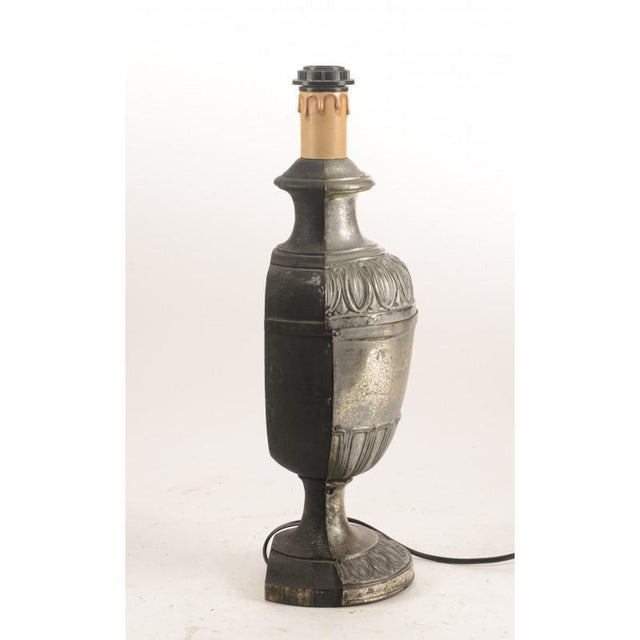 Table lamp holder transformed into a table lamp with wooden frame with the part on the front covered with a sheet of metal...