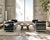 Matching pair of lc2 two-seater sofas designed in 1929 by le corbusier, charlotte perriand and pierre jeanneret. produced...