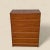 A tall and elegantly proportioned Danish teak dresser from the 1960s, offering five drawers within a compact footprint....