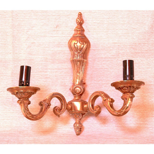 Very elegant Neo-Classical Pair of two-light sconces, "S" shape arms, and beautifully craved with plants and flowers....