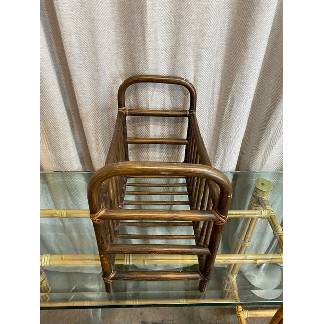 Mid-Century Modern era, racionalist style, dark stained natural bamboo magazine rack.