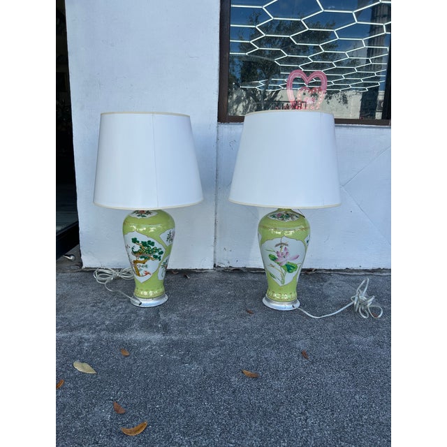 Standout pair of Chinese table lamps once vases now converted to lamps, crafted in porcelain in classic form, hand...