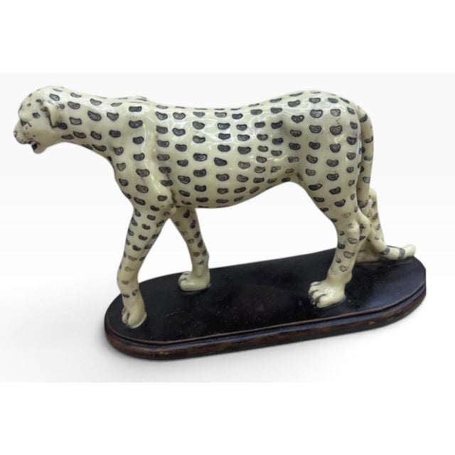 Charming vintage ceramic leopard sculpture, hand decorated with an expressive spotted pattern in black over a warm ivory...