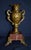 Antique - Mid 19th Century Vase w/Marble Base has a French Rocco Style. Made of Metal with a Marble Base. Bronze Color,...