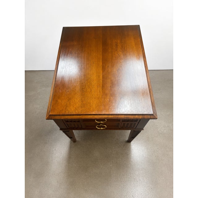 Beautiful Heritage wooden side table with a warm medium-brown finish, classic tapered legs, detailed paneling, and brass...