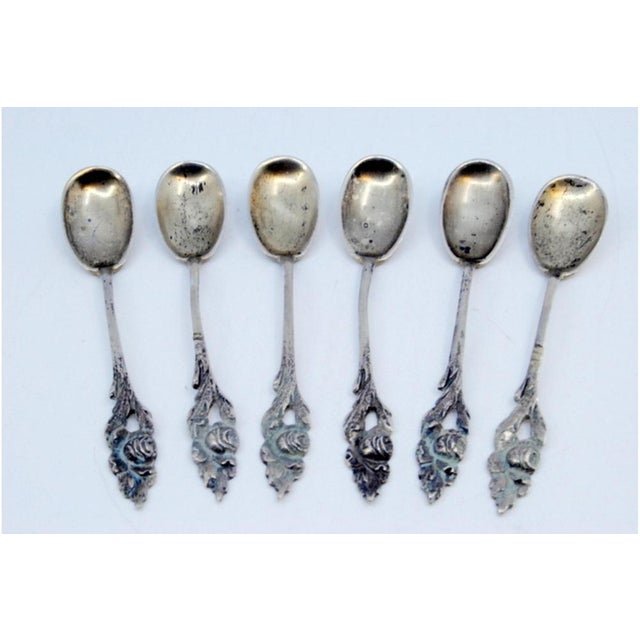Silver Coffee Spoons with Raised Handles, Set of 6, in Very Good conditions. Designed 1890 to 1919 This piece has an...