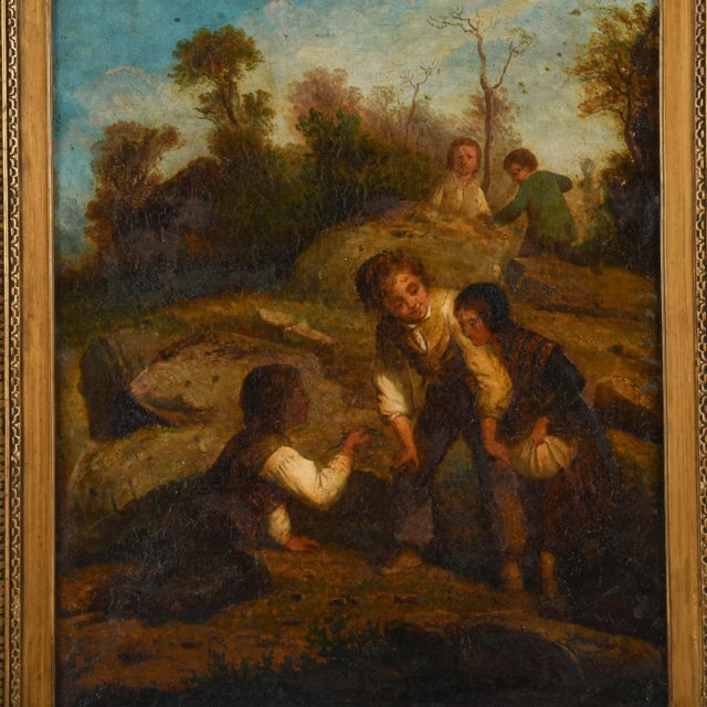 This Framed Ludwig Knaus "Child Explorers" Oil on Canvas depicts a group of children in a sun-dappled clearing, gathered...