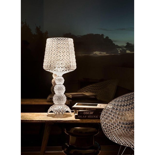 Full-body crystal texture glass (with hollow carvings), integrated lamp body and shade design. Light shows brilliant light...