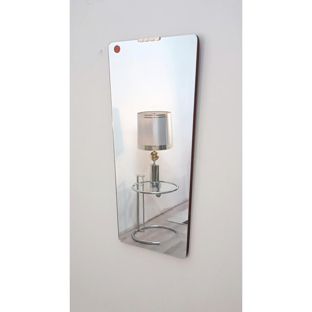 Magnificent trapezoidal mirror by Fratelli Fanzago. Italy, 1960s. An extremely rare piece from this Italian workshop,...