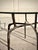 Bronze Sculptural Antique Bronzed Iron Legs Round 48” Glass Top Cyrano Dining Table by Made Goods For Sale - Image 8 of 11