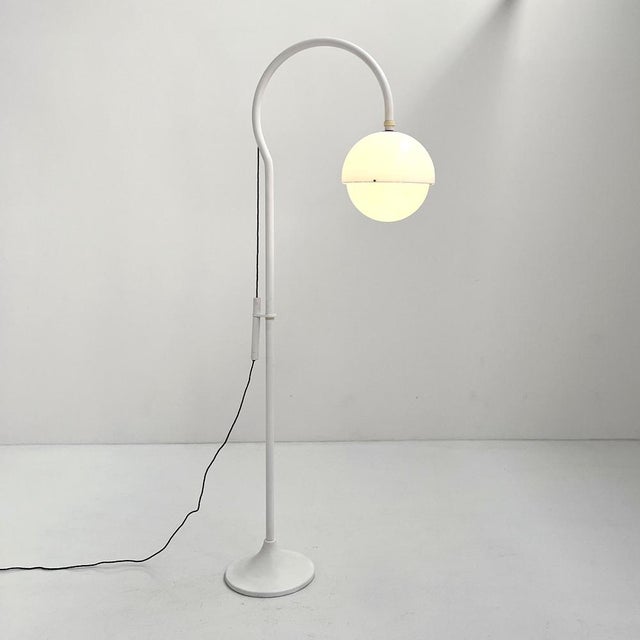 Model 4055 Floor Lamp attributed to Luigi Bandini Shop for Kartell, 1960s, in Good conditions. Designed 1960 to 1969 This...