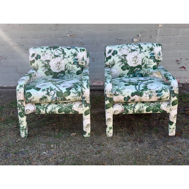 These are a charming pair of vintage armchairs with clean, tailored lines, straight legs, and supportive box cushions — a...