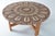 A striking and dramatic circular ceramic tile top coffee table with a beautiful teak base. It is a Danish table by Ox Art...