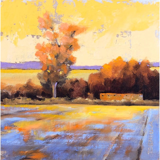 This pastel artwork features a serene landscape bathed in warm, golden light, with a striking tree showcasing autumn hues...