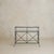Line and structure define this vintage French iron and glass console from La Roque, France dating to the 1980s, where...
