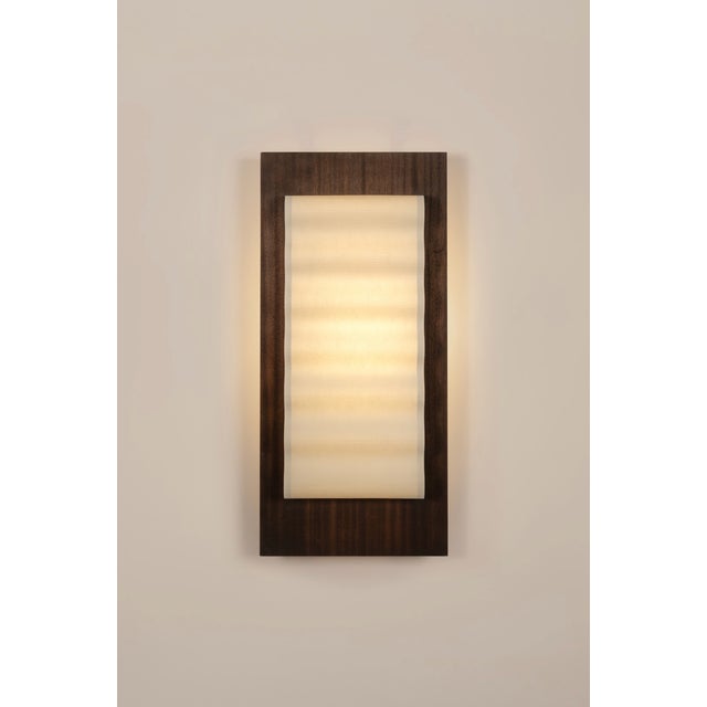 Introducting Frame, a collection of handcrafted wall sconces. Featuring a minimalist design, simple forms, and the subtle...