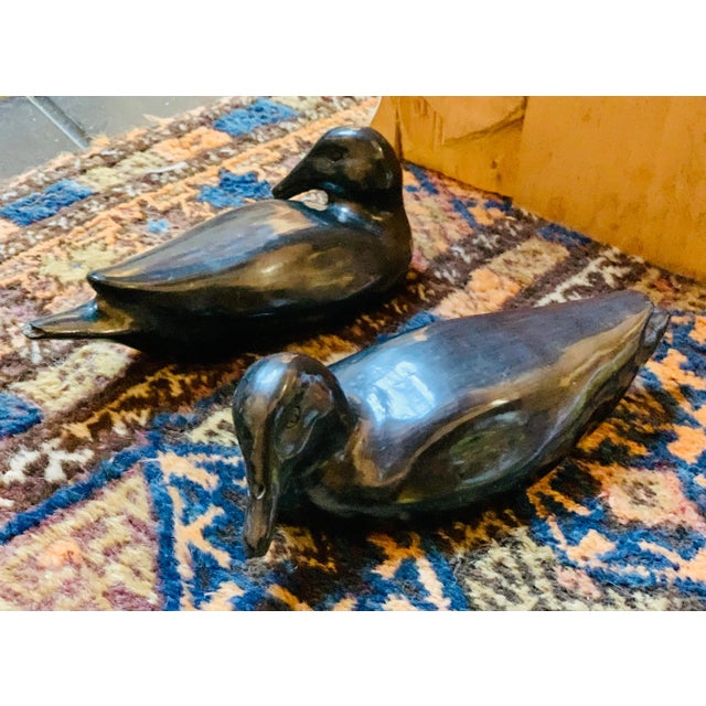 A Rare Pair of Vintage Oaxaca Black Pottery Ducks, Artist Signed On The Bottom by Doña Rosa, Coyotepec. This pair of hand...