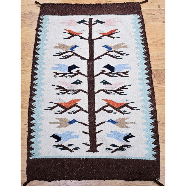 This wonderfully simple yet deeply beautiful vintage Navajo rug features the iconic Tree of Life design�a powerful symbol...