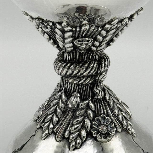 Silver Vase in chalice form with wheat decoration in the middle of the bowl and base. This piece is 19th by Buccellati...