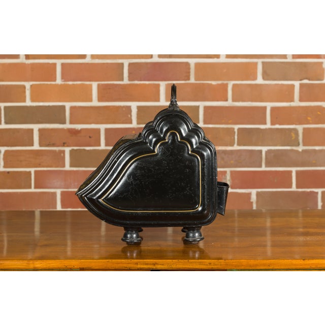 An English Victorian period black coal box from circa 1880 with hand-painted King Charles Spaniel dog motif and gilded...